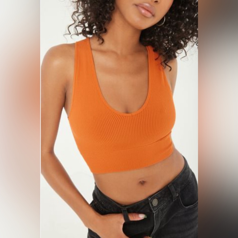 Two Garage tank tops in orange and purple